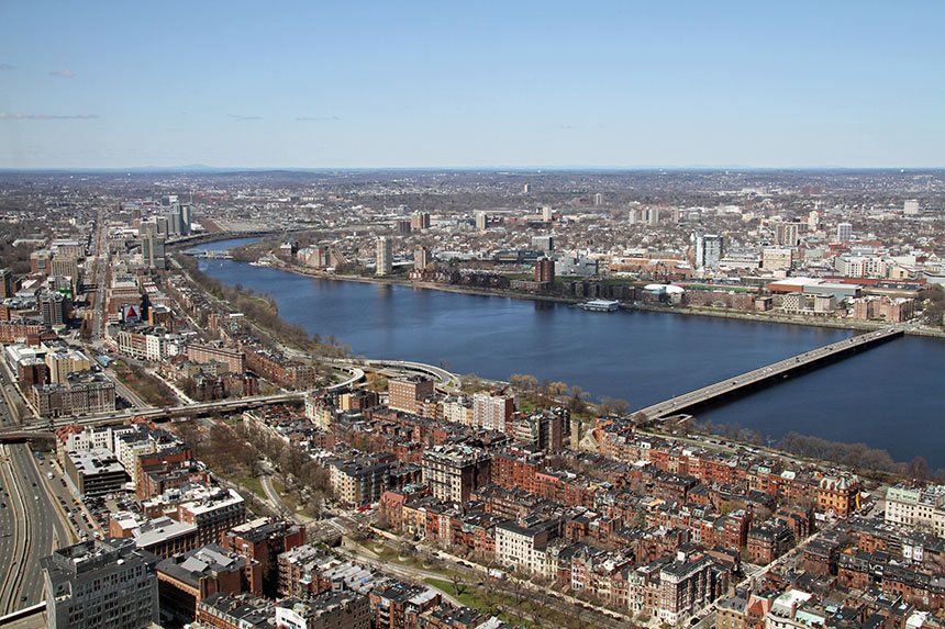 Ariel shot of NECO with Charles River in background looking into Cambridge