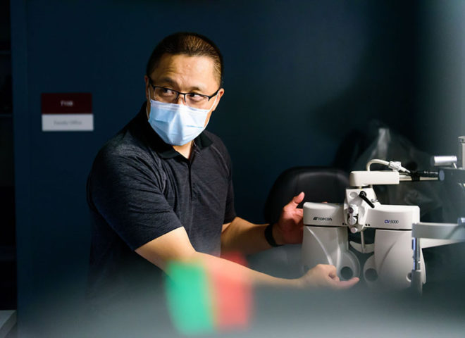 Gary Chu adjusts equipment