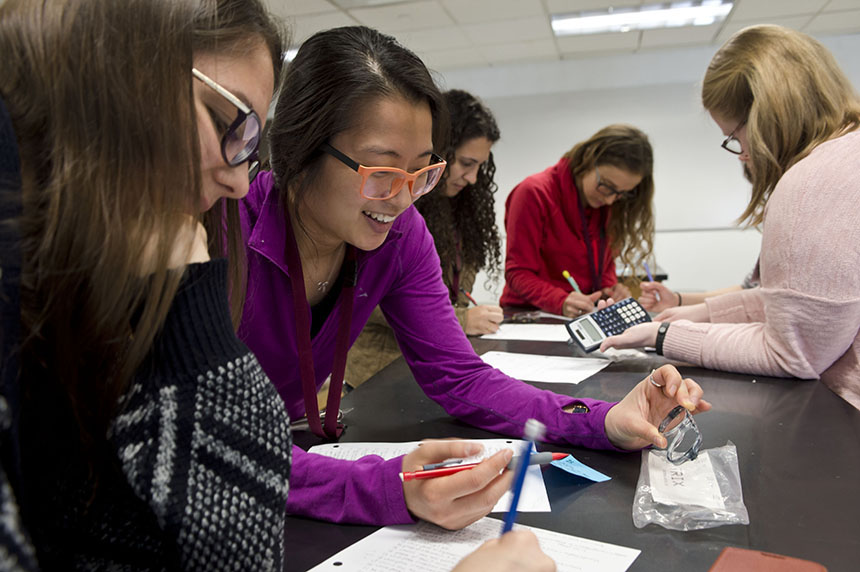 Five female students working together in the clinic.