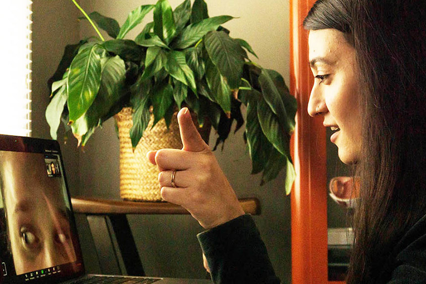 student performs eye exam remotely with patient on a video call