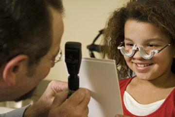 Child getting an eye exam.