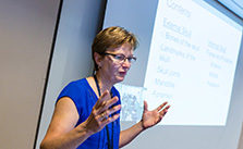 Faculty member teaching in class.