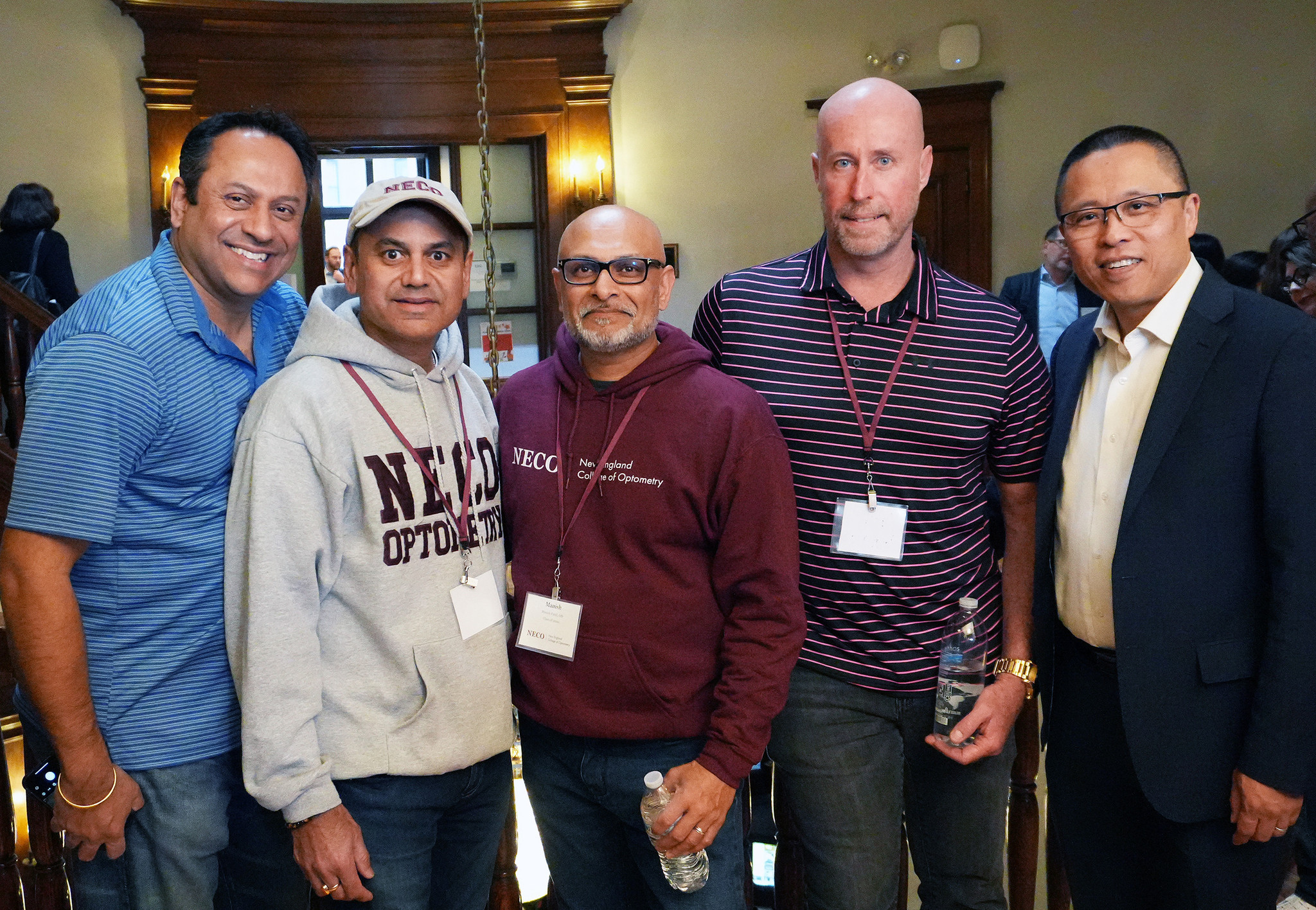 five men standing together for a picture